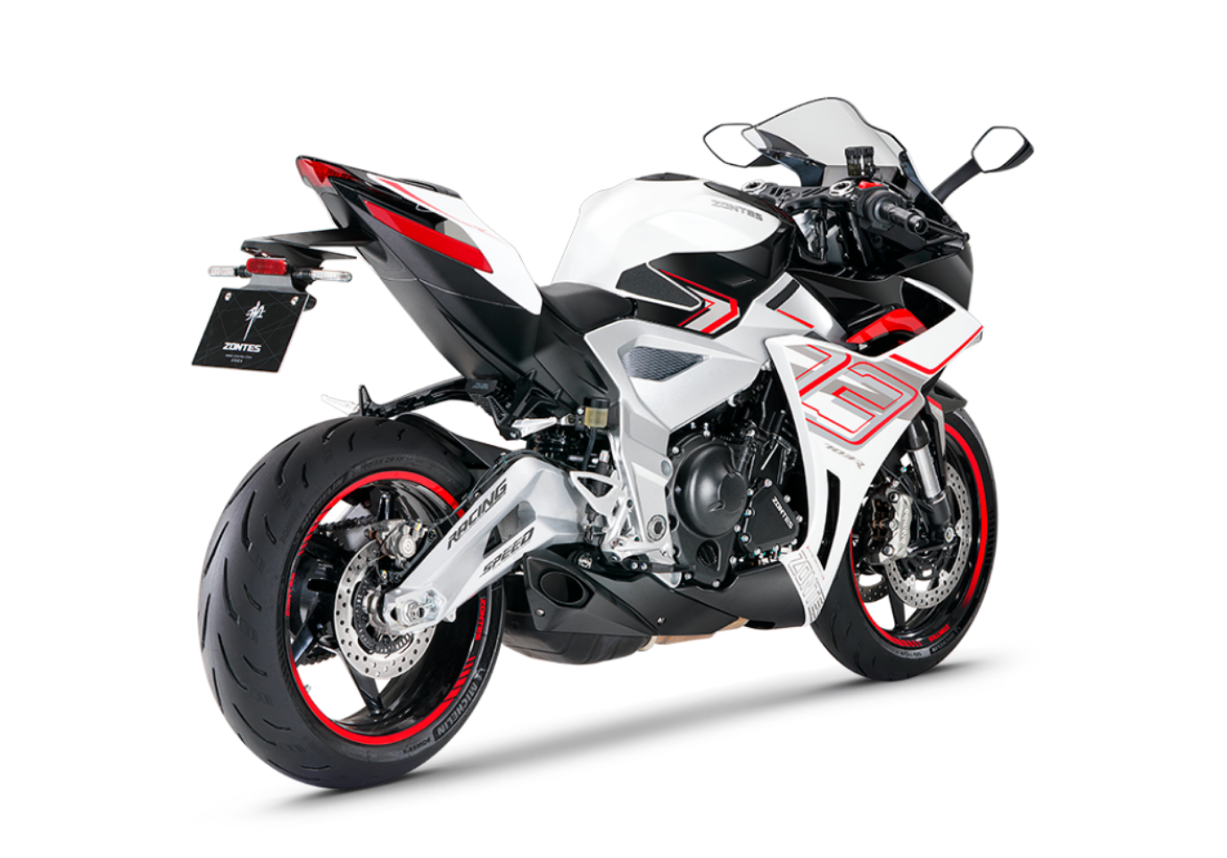 Moto ZT703-RR a vermelho e branco vista 45º traseira do lado direito.